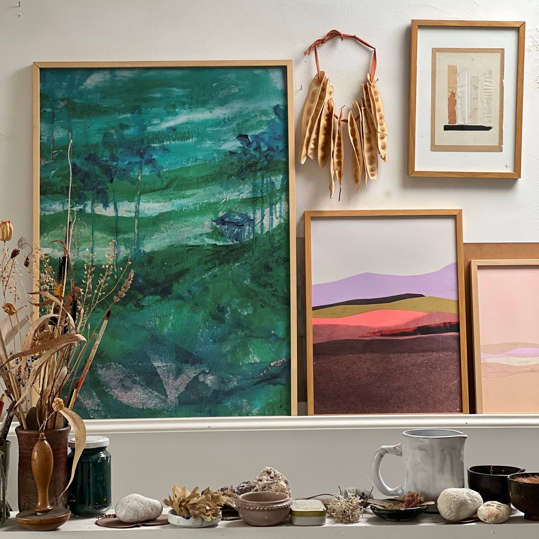 Nature-inspired green wall art “Bali” styled with dried florals, ceramics, and earthy decor.