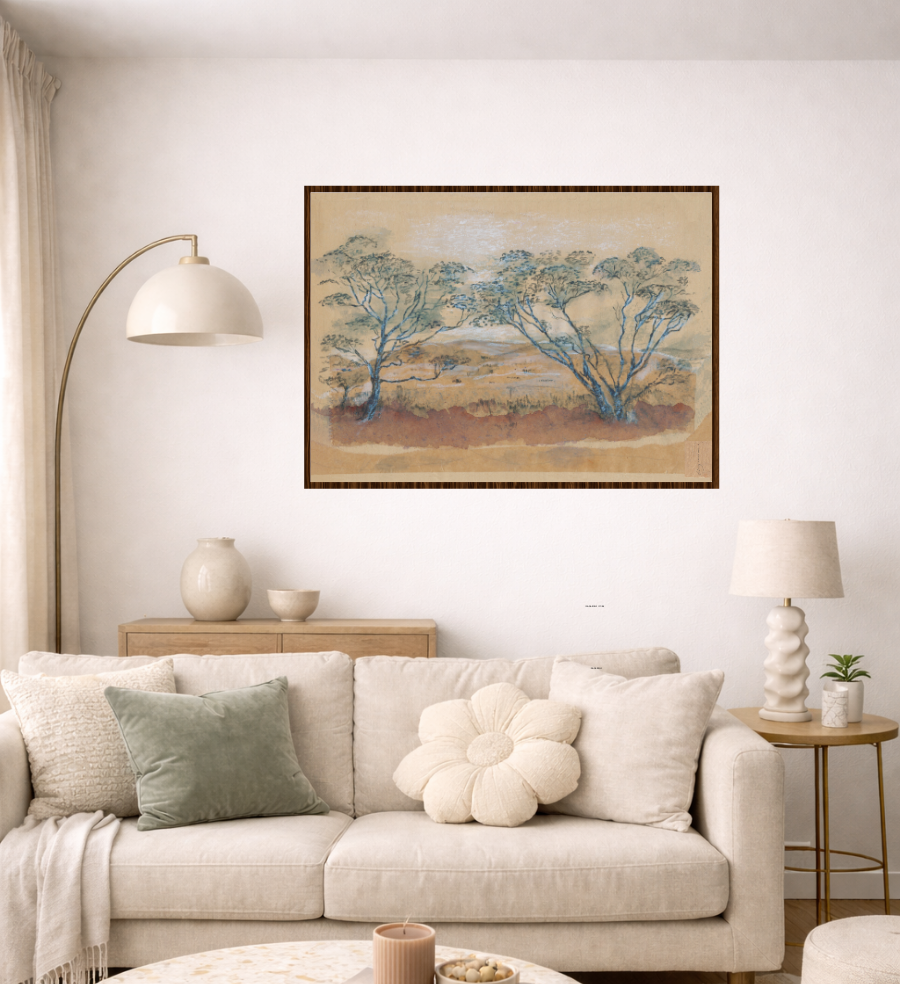 Living room with beige sofa, round marble coffee table, and framed artwork on the wall.